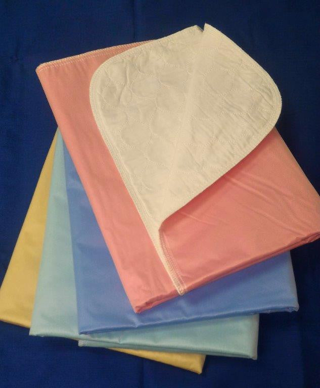 IN107319 34x36 55% Cotton / 45% Polyester 4.1 oz Super Twill  Face Fabric, Small Onion Quilt Pattern with Pink Vinyl Barrier and 6.0 oz soaker $59.13/dz 2 dz Case Price